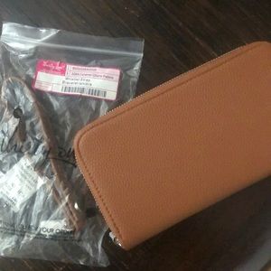 Wallet with wristlet strap